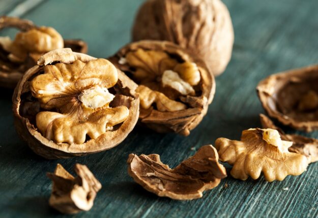 Walnuts on wooden table